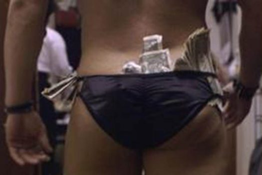 throwing money at the preacher's feet